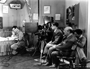 Film set, with father and baby, The Single Standard Josephine Lovette (w). PC