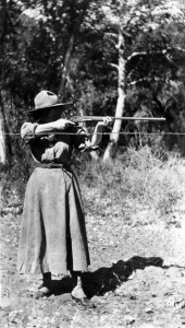 Bertha Muzzy Bower with rifle (w) OUL-WHC